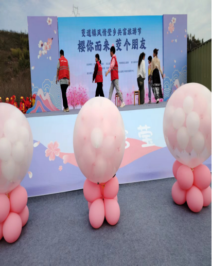 浙江省武义县茭道镇：千树万树樱花开  反邪教宣传迎客来394.png