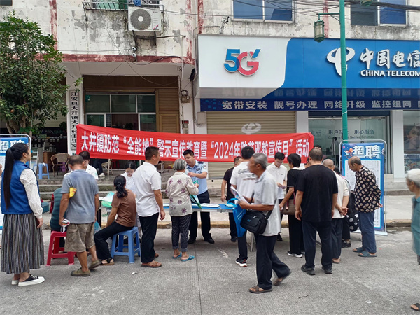四川宜宾江安大井开展反邪教宣传活动图片1.jpg